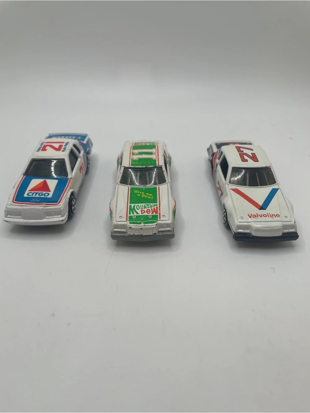 Three vintage  1:64 scale ERTL 1980’s stock cars